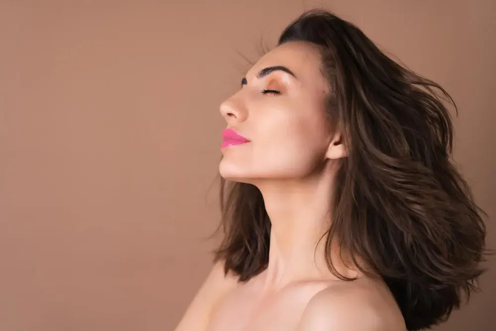 Morpheus8 device handpiece treating facial skin for tightening in London